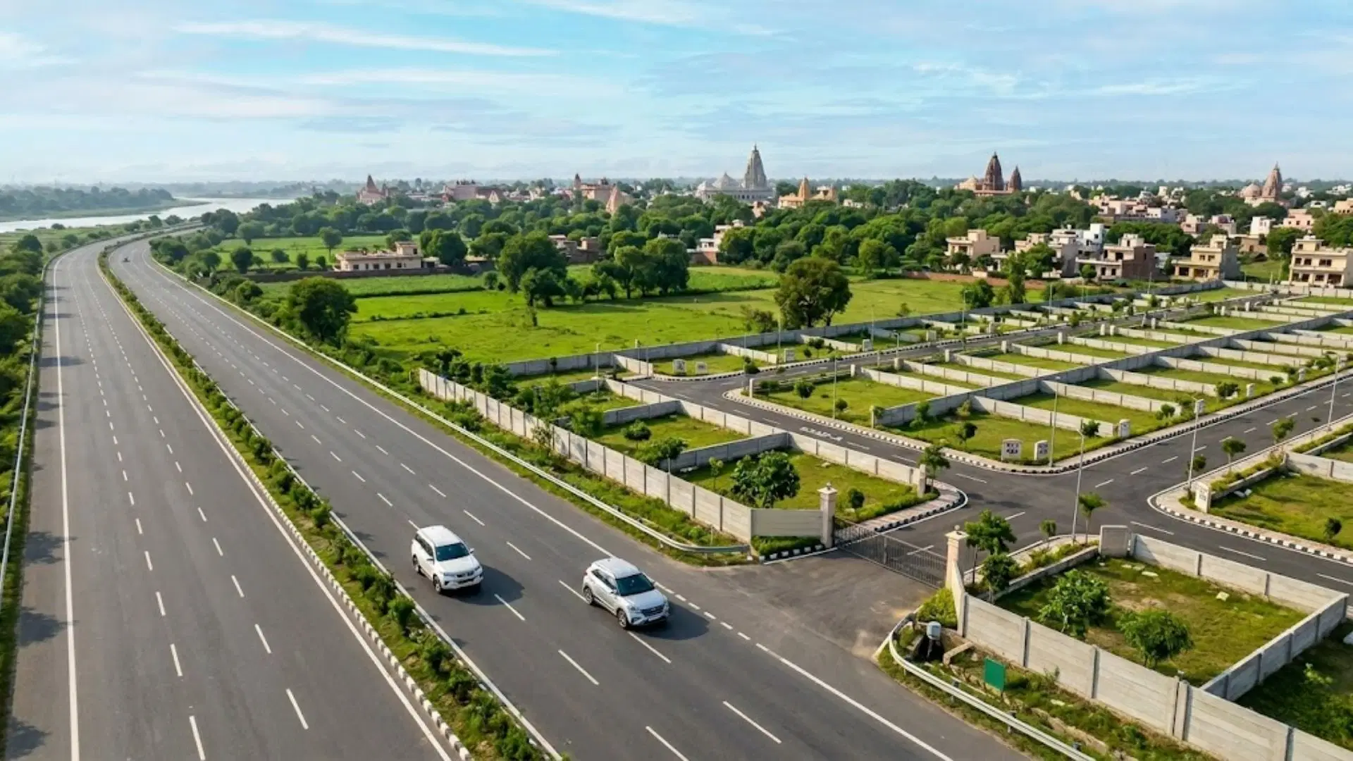 Plotted development and wide road connectivity near Vrindavan, showing why Delhi-NCR buyers are considering weekend home plots.