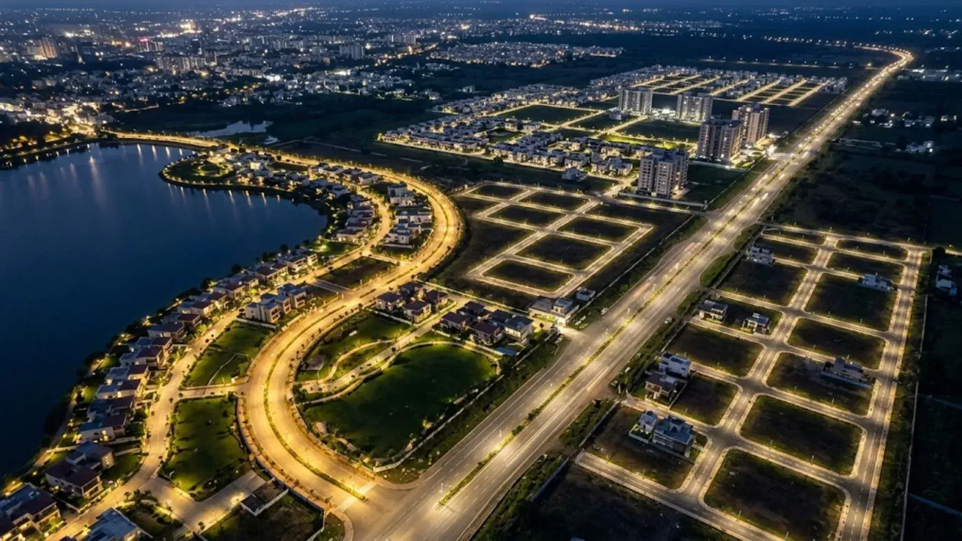 Aerial view of plotted development in Nagpur with lakefront areas, road connectivity and city-edge plots